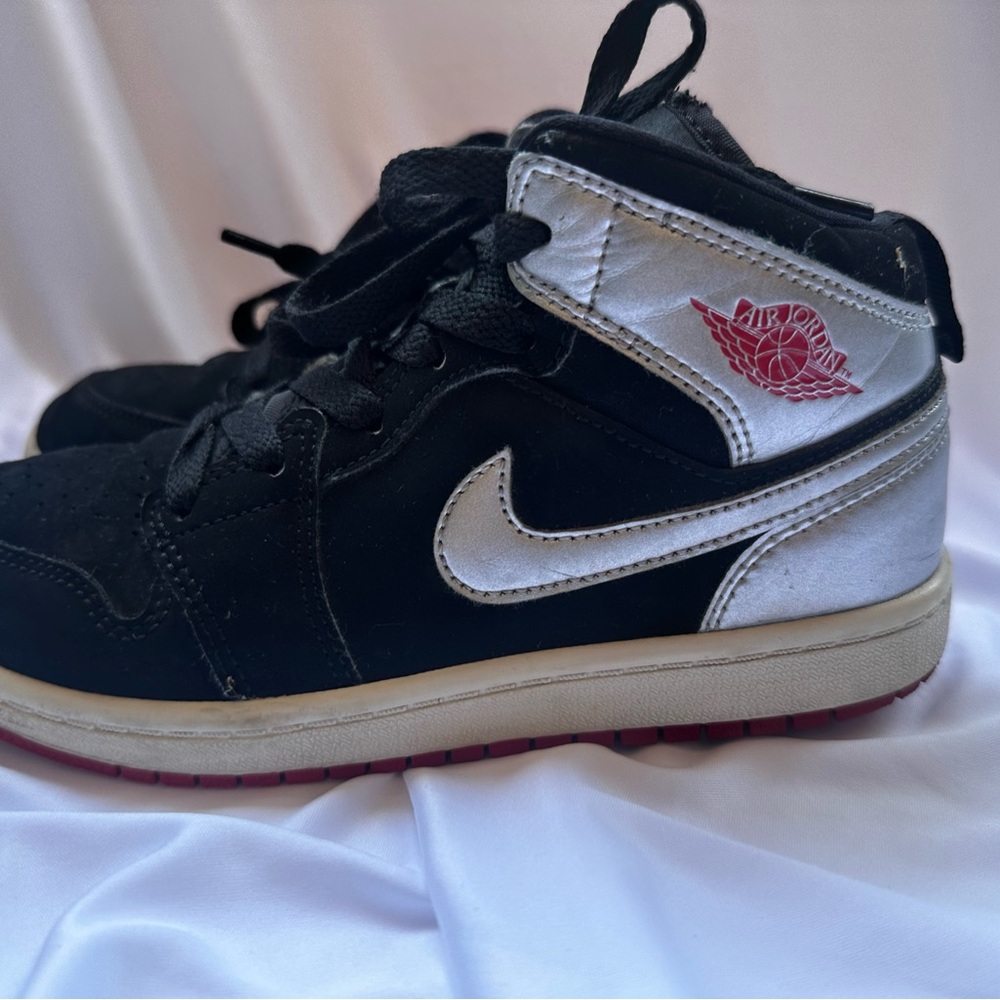 Jordan Kids Black and White High-Top Sneakers